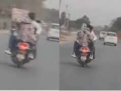 चलती स्कूटी पर कपल का खतरनाक स्टंट कैमरे में कैद, सोशल मीडिया पर मचा बवाल